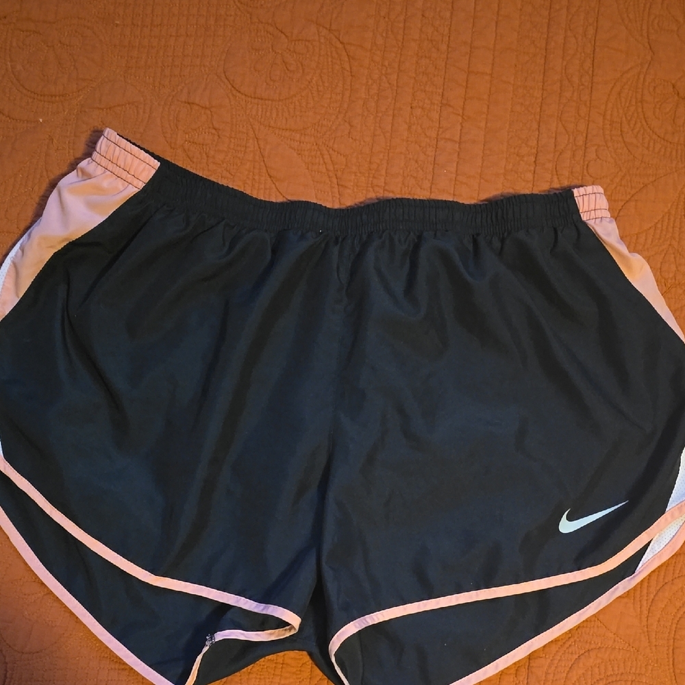 Nike Black and Pink Athletic Shorts with Curved Hem